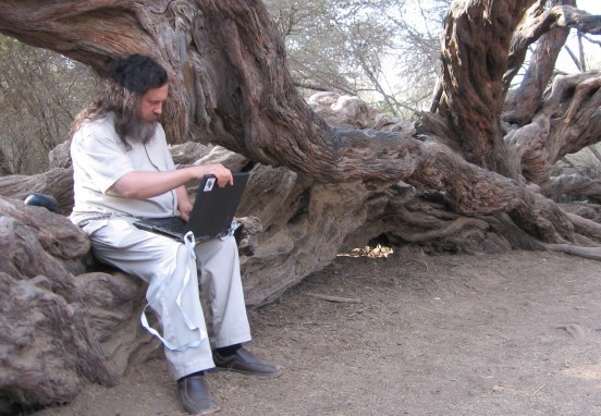 Rare picture of Stallman sitting on a tree.jpg
